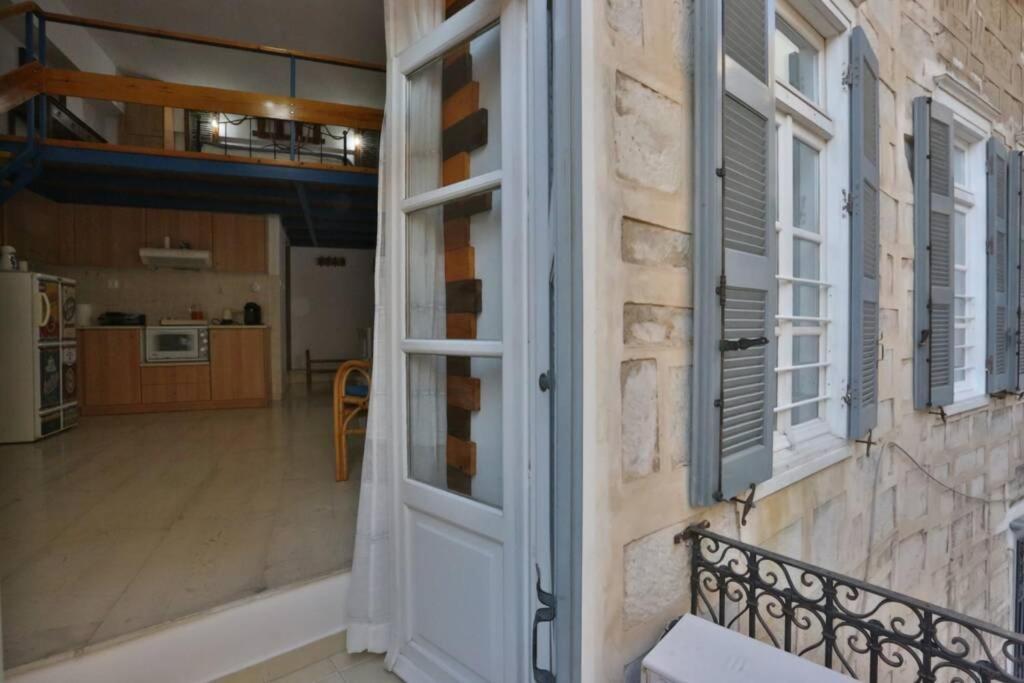 Lignum Apartment Ermoupoli Bagian luar foto